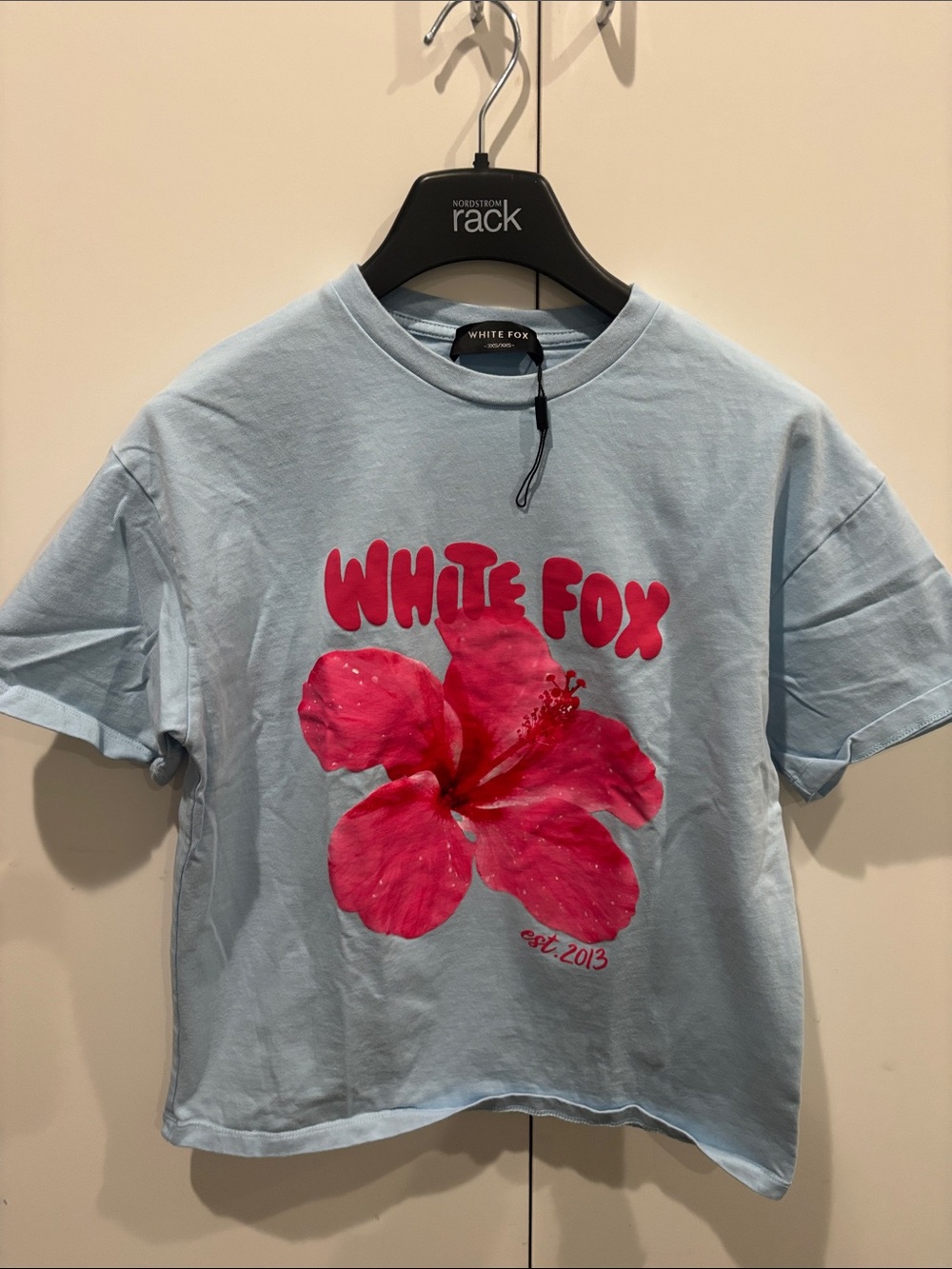 White Fox Boutique Light Blue Tee with Pink Hibiscus Graphic